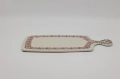 This impressive, hand-decorated ceramic board is the perfect blend of function and art, ideal for elegantly serving large platters of cold cuts, cheeses, or bread. Made from durable Bolesławiec stoneware.